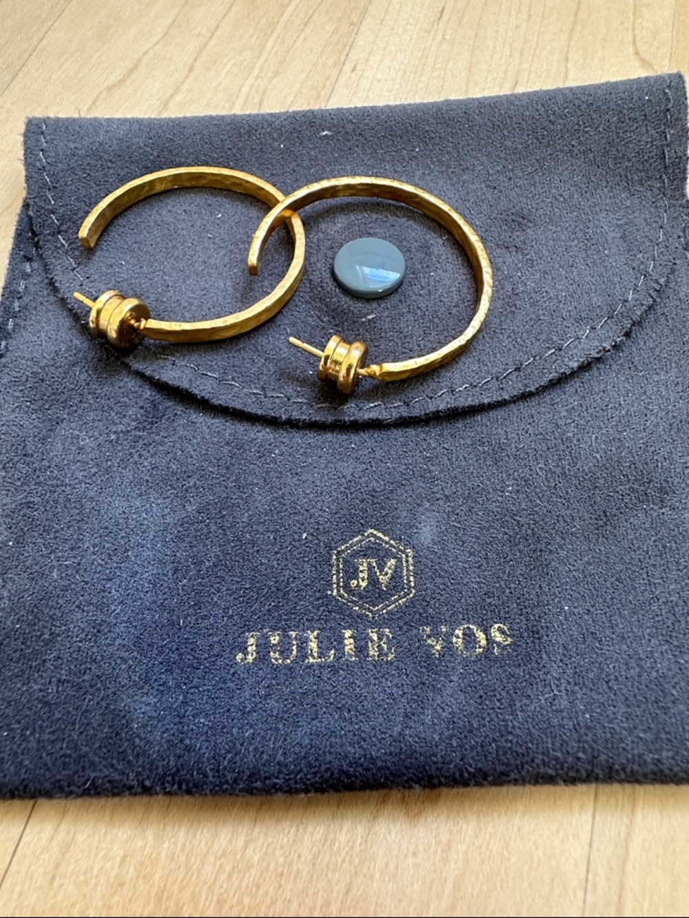 Julie Vos Gold Textured Hoop Earrings with grey jewelry pouch.